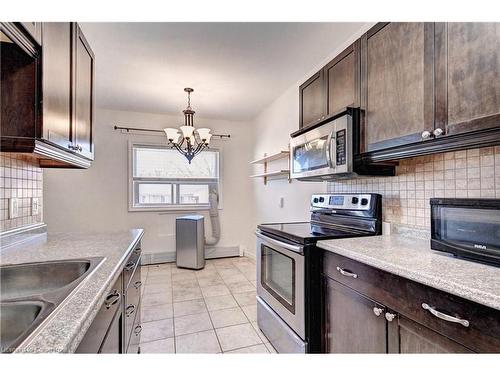 306-283 Fairway Road N, Kitchener, ON - Indoor Photo Showing Kitchen