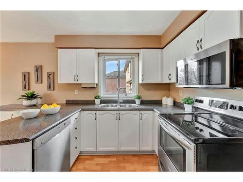 59 Nith River Way, Ayr, ON - Indoor Photo Showing Kitchen With Double Sink