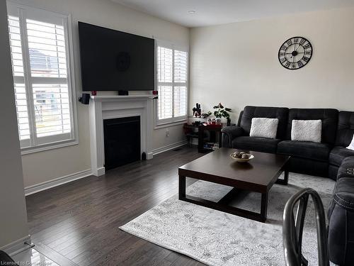 113 Chandler Terrace, Woodstock, ON - Indoor Photo Showing Living Room With Fireplace