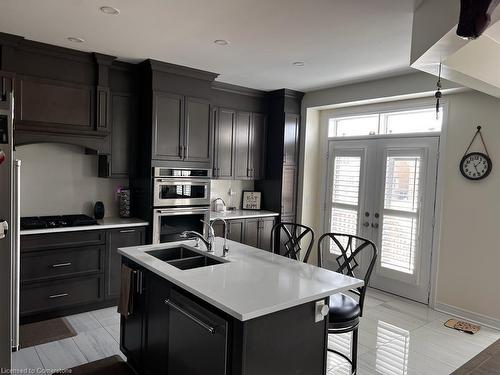 113 Chandler Terrace, Woodstock, ON - Indoor Photo Showing Kitchen With Stainless Steel Kitchen With Double Sink