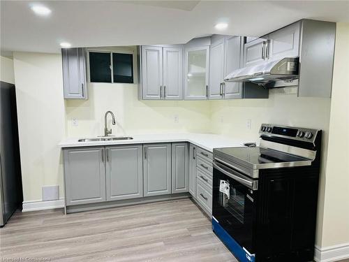 113 Chandler Terrace, Woodstock, ON - Indoor Photo Showing Kitchen With Double Sink