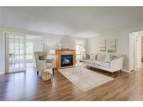 15 Rolling Brook Lane, New Hamburg, ON - Indoor Photo Showing Living Room With Fireplace