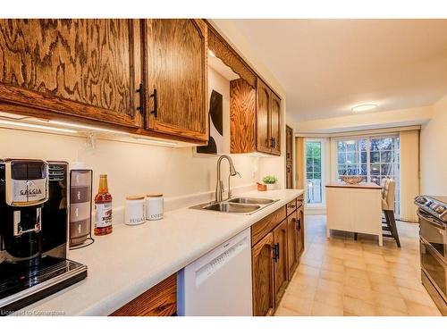 1-494 Beechwood Drive, Waterloo, ON - Indoor Photo Showing Kitchen With Double Sink