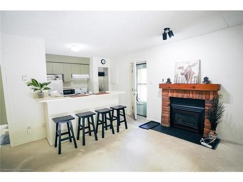 48-19 Dawson Drive, Collingwood, ON - Indoor Photo Showing Living Room With Fireplace