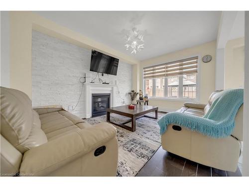 1161 Upper Thames Drive, Woodstock, ON - Indoor Photo Showing Living Room With Fireplace