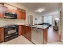 205-3504 Hurontario Street, Mississauga, ON  - Indoor Photo Showing Kitchen With Double Sink 