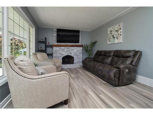 A-115 Uplands Drive, Kitchener, ON - Indoor Photo Showing Living Room With Fireplace