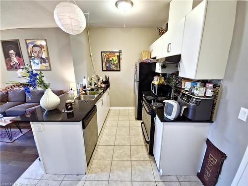 110-1360 Costigan Road, Milton, ON - Indoor Photo Showing Kitchen With Double Sink