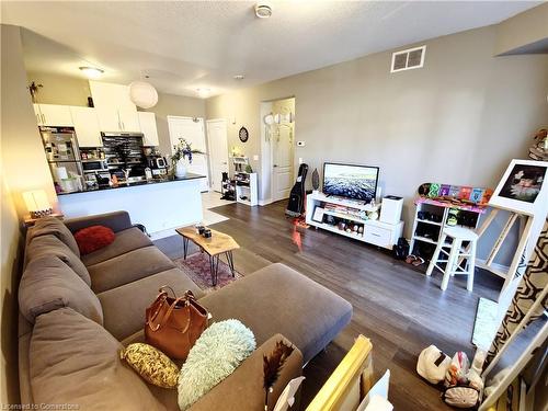 110-1360 Costigan Road, Milton, ON - Indoor Photo Showing Living Room