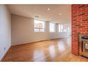 703-20 Ellen Street E, Kitchener, ON  - Indoor Photo Showing Other Room With Fireplace 