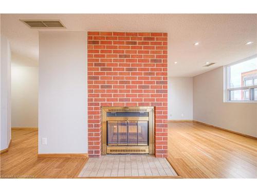 703-20 Ellen Street E, Kitchener, ON - Indoor Photo Showing Other Room With Fireplace