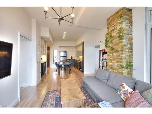 709-191 King Street S, Waterloo, ON - Indoor Photo Showing Living Room With Fireplace