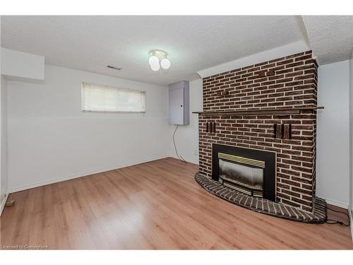 894 Strasburg Road, Kitchener, ON - Indoor Photo Showing Living Room With Fireplace