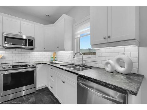 60-375 Mitchell Rd S Road S, Listowel, ON - Indoor Photo Showing Kitchen With Double Sink With Upgraded Kitchen