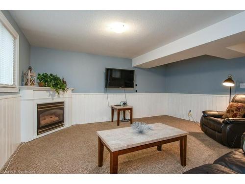 8 Dawn Ridge Drive, Kitchener, ON - Indoor Photo Showing Living Room With Fireplace