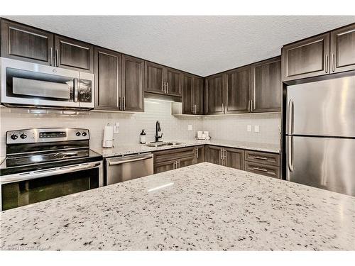 D-20 Sienna Street, Kitchener, ON - Indoor Photo Showing Kitchen With Stainless Steel Kitchen With Upgraded Kitchen