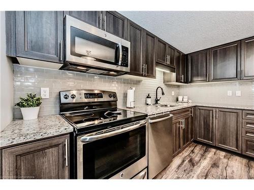 D-20 Sienna Street, Kitchener, ON - Indoor Photo Showing Kitchen With Stainless Steel Kitchen With Upgraded Kitchen