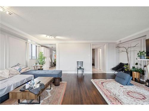 701-1255 Commissioners Road W, London, ON - Indoor Photo Showing Living Room With Fireplace