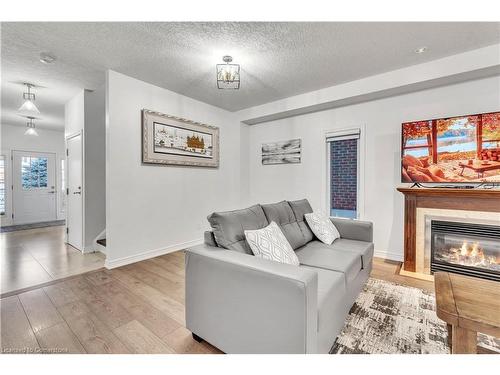 48 Isaiah Drive, Kitchener, ON - Indoor Photo Showing Living Room With Fireplace