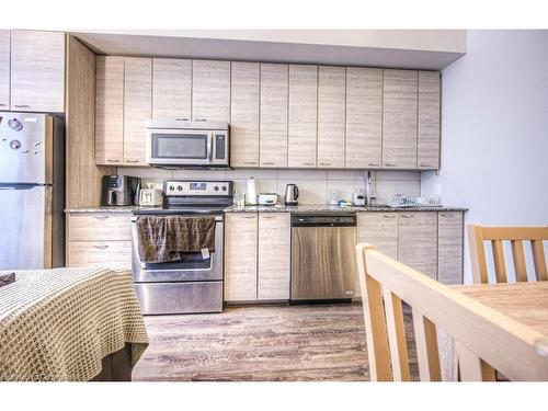 104-253 Albert Street N, Waterloo, ON - Indoor Photo Showing Kitchen With Stainless Steel Kitchen