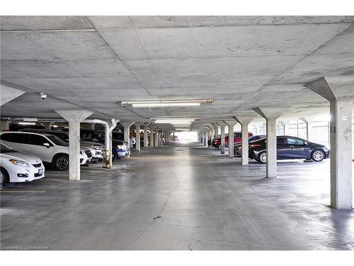 709-55 Green Valley Drive, Kitchener, ON - Indoor Photo Showing Garage