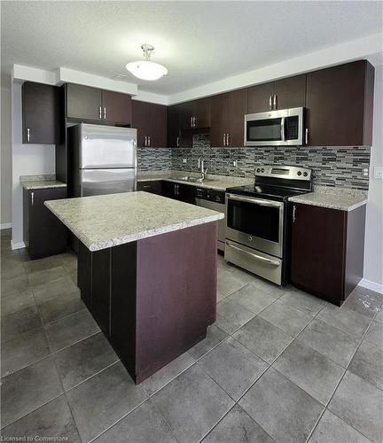 C-235 Rachel Crescent, Kitchener, ON - Indoor Photo Showing Kitchen With Double Sink