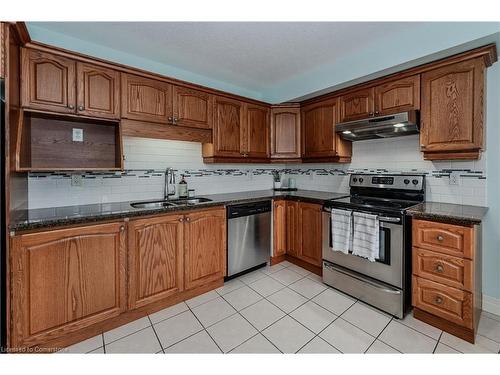 302-1522 King Street E, Kitchener, ON - Indoor Photo Showing Kitchen With Stainless Steel Kitchen With Double Sink