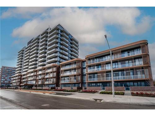 Th104-220 Missinnihe Way, Mississauga, ON - Outdoor With Balcony With Facade