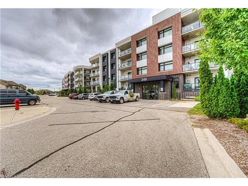 303-249 Grey Silo Road, Waterloo, ON - Outdoor With Balcony With Facade