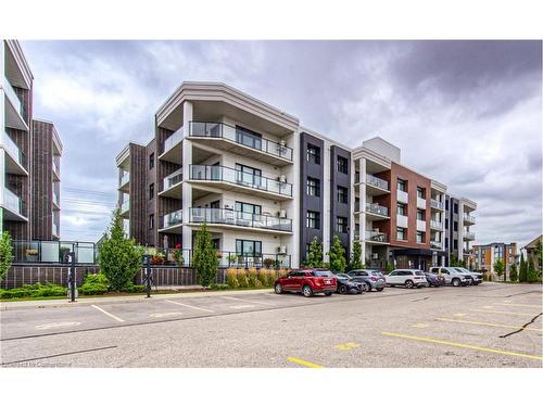 303-249 Grey Silo Road, Waterloo, ON - Outdoor With Balcony With Facade