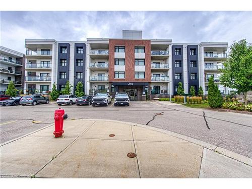 303-249 Grey Silo Road, Waterloo, ON - Outdoor With Balcony With Facade