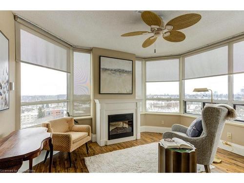 1602-6 Willow Street, Waterloo, ON - Indoor Photo Showing Living Room With Fireplace