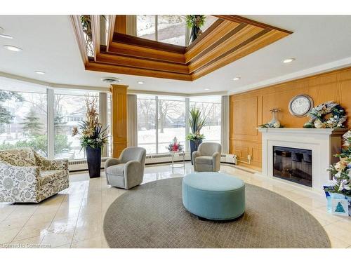 1602-6 Willow Street, Waterloo, ON - Indoor Photo Showing Living Room With Fireplace