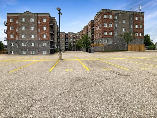 304-7 Rittenhouse Road, Kitchener, ON - Outdoor With Balcony With Facade