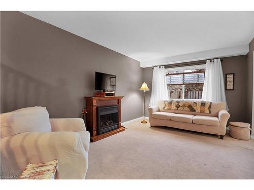 14-30 Bryan Court, Kitchener, ON - Indoor Photo Showing Living Room With Fireplace