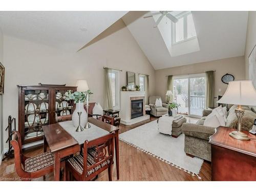 5A-350 Doon Valley Drive, Kitchener, ON - Indoor Photo Showing Living Room With Fireplace