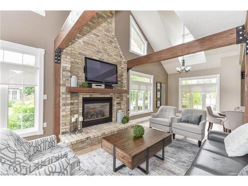 5A-350 Doon Valley Drive, Kitchener, ON - Indoor Photo Showing Living Room With Fireplace