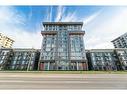 1105-460 Dundas Street E, Waterdown, ON  - Outdoor With Facade 