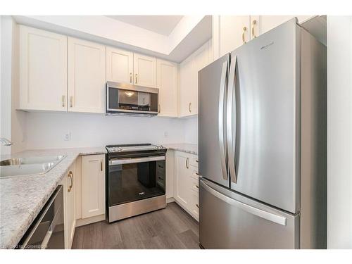 1105-460 Dundas Street E, Waterdown, ON - Indoor Photo Showing Kitchen With Upgraded Kitchen