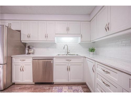 1806-55 Green Valley Drive, Kitchener, ON - Indoor Photo Showing Kitchen With Double Sink