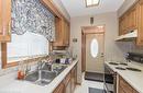 B-635 Pinerow Crescent, Waterloo, ON  - Indoor Photo Showing Kitchen With Double Sink 