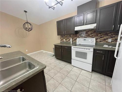 983 Lemonwood Crescent, Windsor, ON - Indoor Photo Showing Kitchen With Double Sink