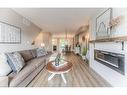 7-600 White Elm Boulevard, Waterloo, ON  - Indoor Photo Showing Living Room With Fireplace 