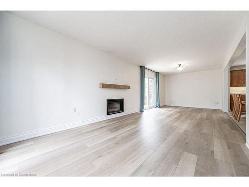 358 New Forest Court, Waterloo, ON - Indoor Photo Showing Living Room With Fireplace