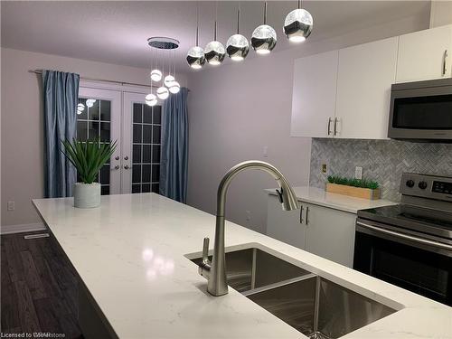 6A-115 South Creek Drive, Kitchener, ON - Indoor Photo Showing Kitchen With Double Sink