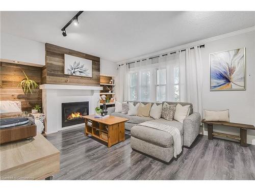 11 Sheldon Avenue S, Kitchener, ON - Indoor Photo Showing Living Room With Fireplace