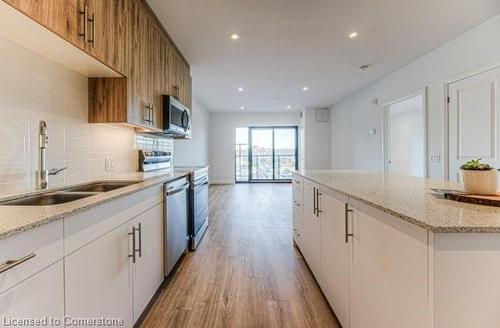 210-525 New Dundee Road, Kitchener, ON - Indoor Photo Showing Kitchen With Double Sink With Upgraded Kitchen