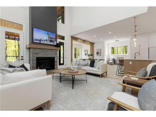 14 St Georges Court, Huntsville, ON - Indoor Photo Showing Living Room With Fireplace