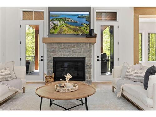 14 St Georges Court, Huntsville, ON - Indoor Photo Showing Living Room With Fireplace