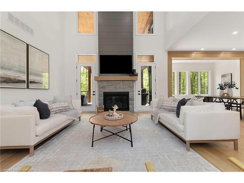 14 St Georges Court, Huntsville, ON - Indoor Photo Showing Living Room With Fireplace